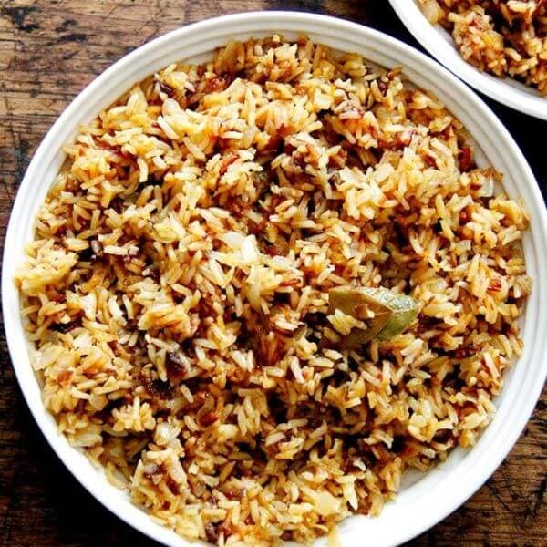 A bowl of Moroccan Rice with dates and harissa.