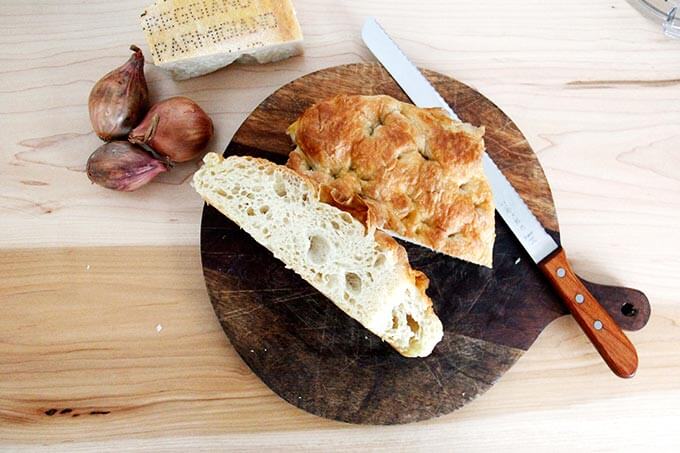 Days-old focaccia on a board. 