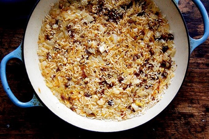 Just-cooked Moroccan rice in a skillet on the stovetop.