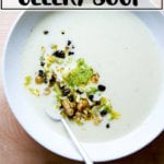 An overhead shot of a bowl of cream of celery soup.