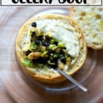 An overhead shot of a bowl of cream of celery soup.