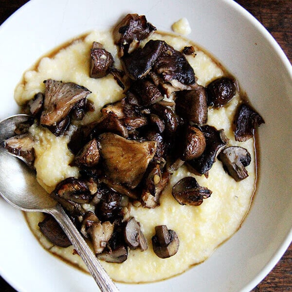 A bowl of oven-baked polenta and mushrooms.