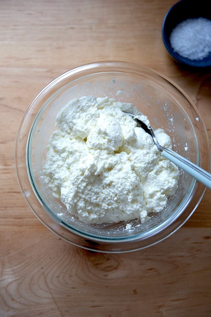 Homemade ricotta in a bowl.