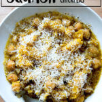 A bowl of garlicky chickpeas topped with roasted spaghetti squash.