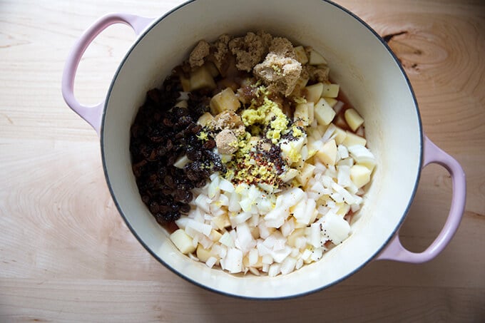 All of the ingredients for the apple chutney recipe in a large pot.