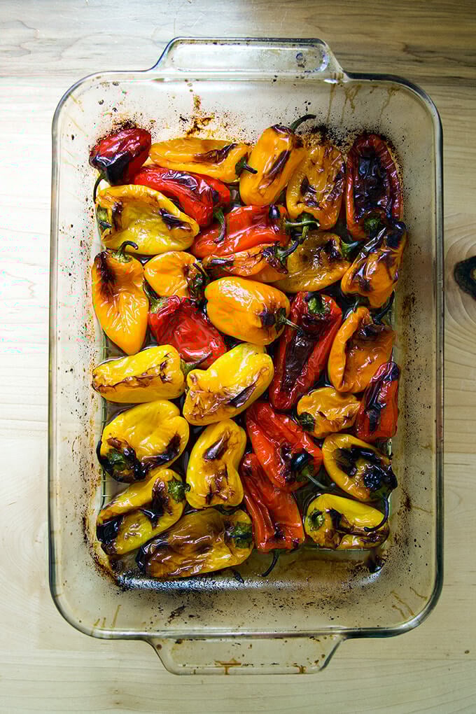 A 9x13-inch pan filled with just-roasted peppers.