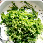 A bowl of snap pea salad with buttermilk dressing.
