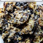 A platter of roasted cabbage wedges topped with walnut salsa.