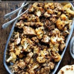 A platter of sheetpan chicken and cauliflower shawarma.