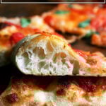 A sideview of a slice of margherita pizza baked on the Baking Steel.