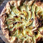 Apple-frangipane galette on a serving board.