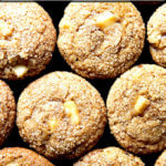 A pan of freshly baked apple orchard muffins.