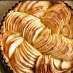 A French apple tart in tart pan.