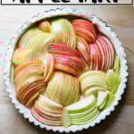 An overhead shot of an unbaked French apple tart.