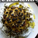 An overhead shot of a whole roasted cauliflower.
