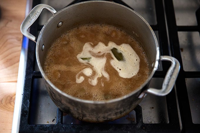 Gravy on the stovetop, simmering.