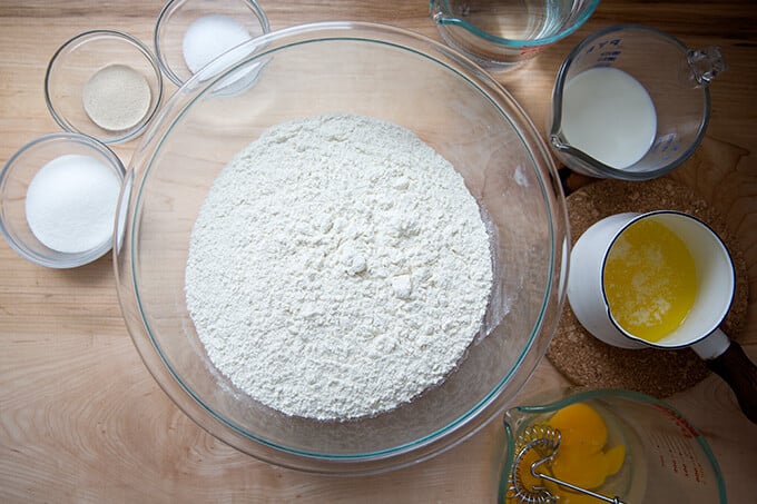 Ingredients to make brioche cinnamon buns on a countertop.