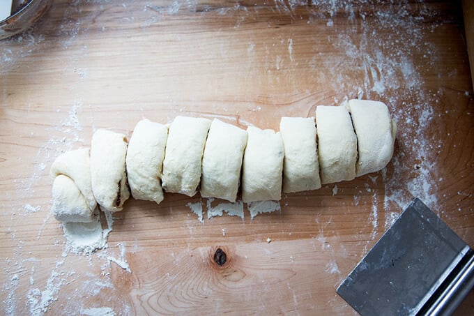 Brioche cinnamon bun coil cut into 9 pieces.