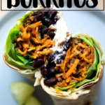 A halved sweet potato and black bean burrito.
