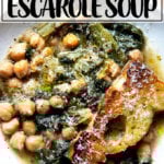 A bowl of chickpea and escarole soup with toasty bread.