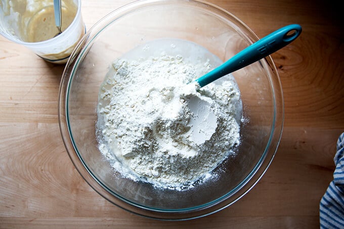 A bowl of unmixed sourdough dough.