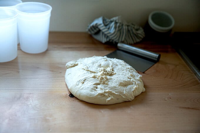 Sourdough pizza dough on the bench.