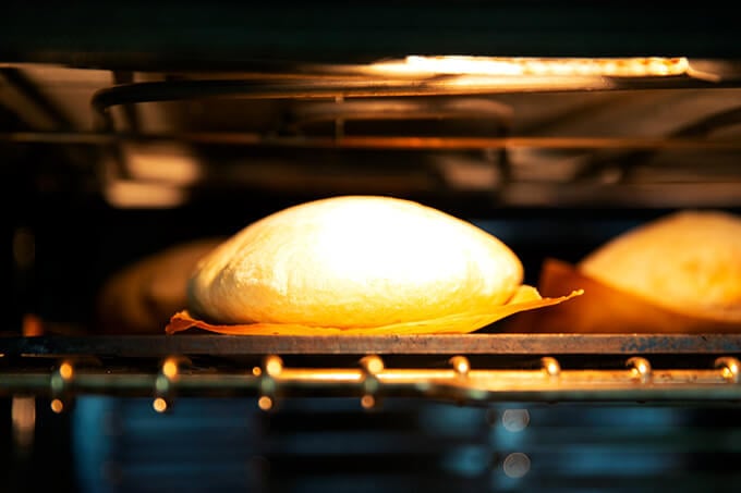 Pita bread puffing way up on a Baking Steel.