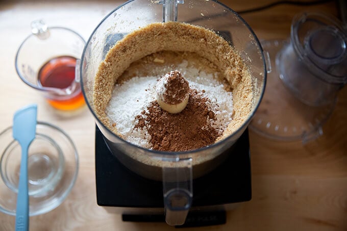 Dry ingredients for rum balls in a food processor.
