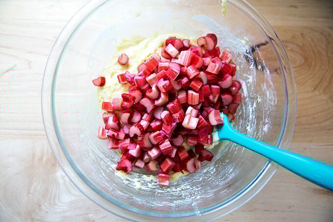 Adding the rhubarb to the batter for the buckle.