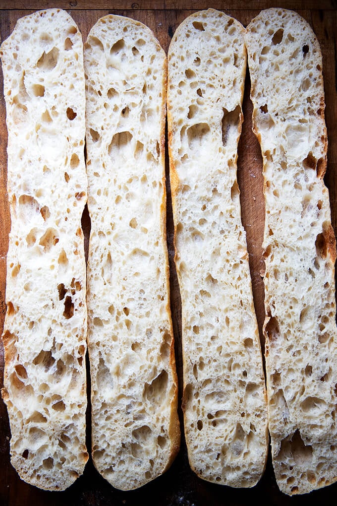 Halved sourdough ciabatta baguettes.