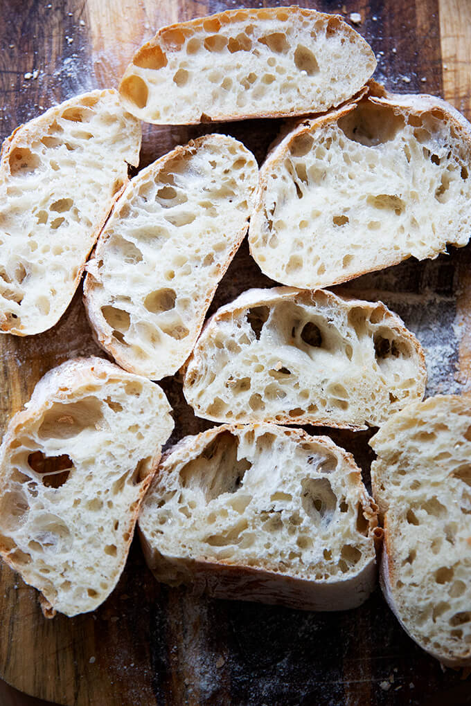 Sliced ciabatta bread on the counter top.