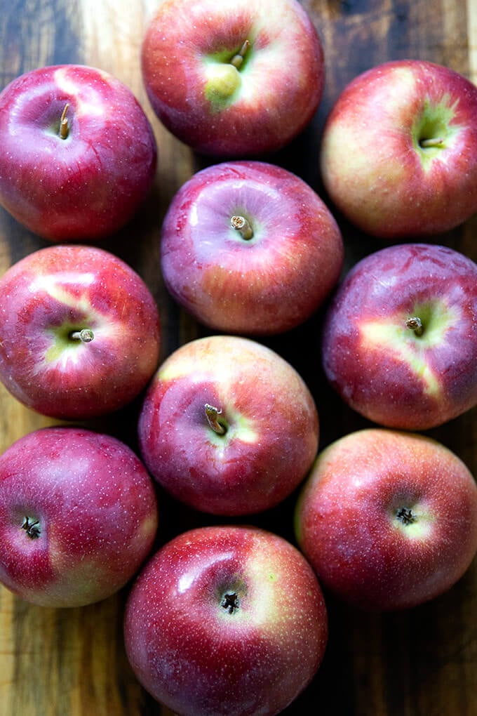 Empire apples on a board.