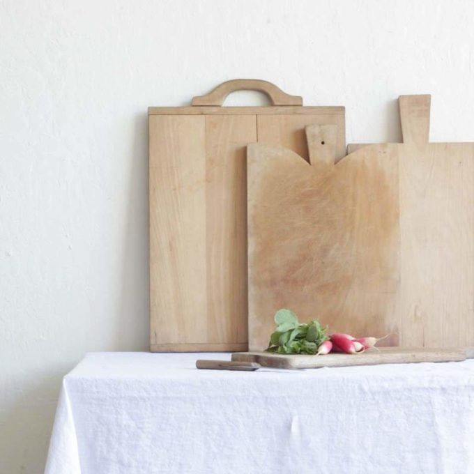 Vintage cutting board on a table.