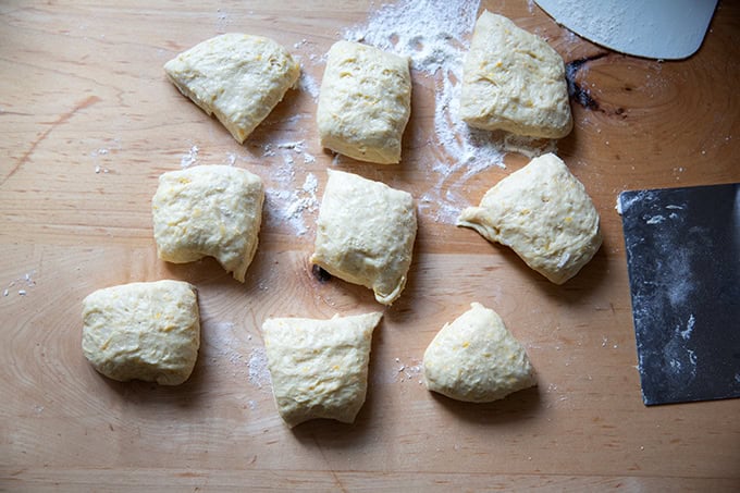 Nine portions of hot cross bun dough.
