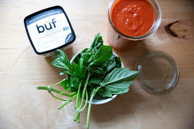 Bufalo mozzarella, basil, and no-cook tomato sauce.