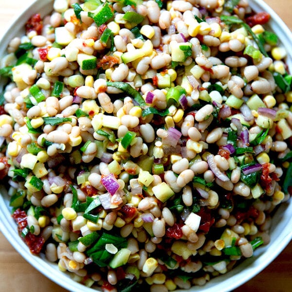 A bean salad in a serving bowl.