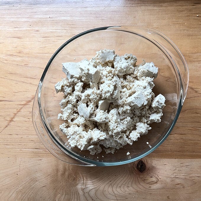 A bowl of tofu crumbles.