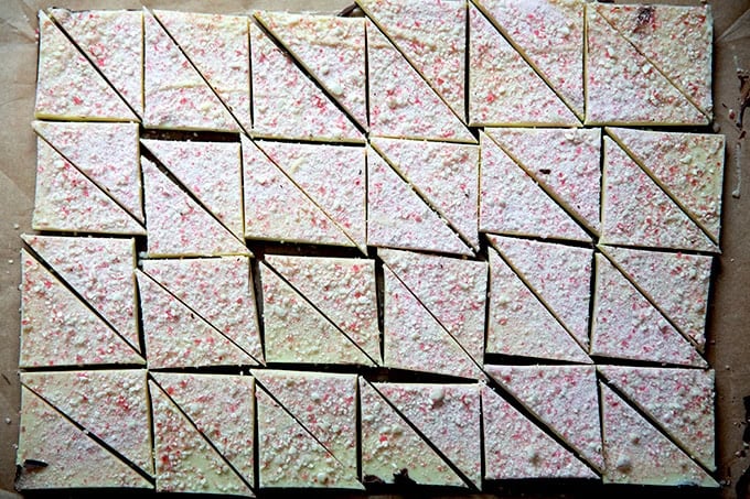 Peppermint bark cut into triangles.