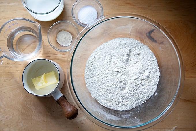 The ingredients to make sandwich bread on a counter top.