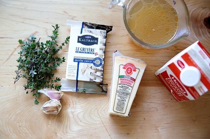 Ingredients to make potato gratin on a countertop.