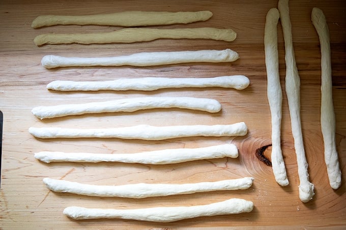 Logs of pretzel dough.