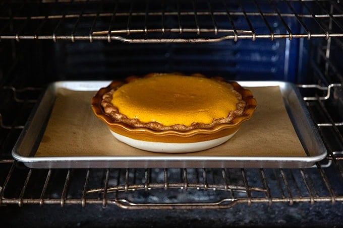 A butternut squash pie in the oven.