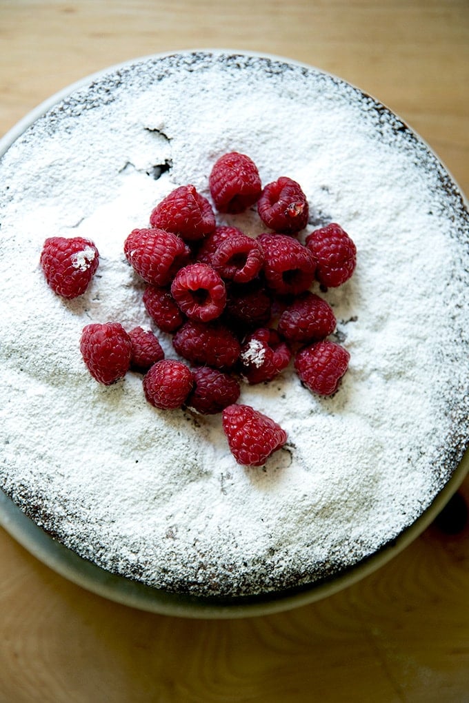 Just baked torta caprese with raspberries on top.