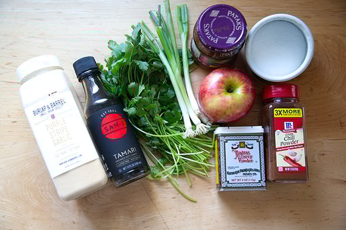 The ingredients to make turkey burgers on a countertop.