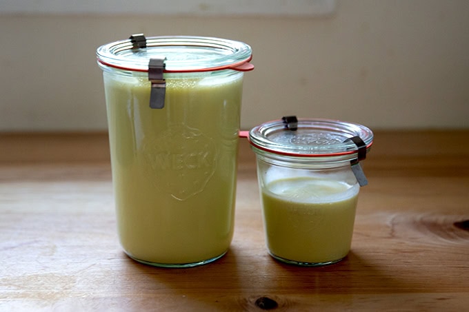 Two jars of Caesar dressing.