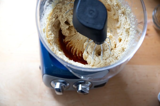 An Ankarsrum mixer filled with creamed butter and sugar, eggs, and vanilla.
