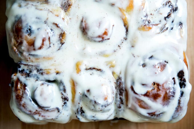 Frosted cinnamon brioche buns.
