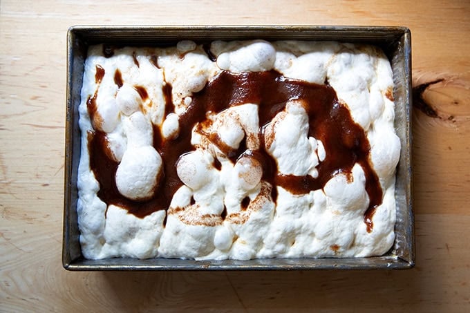 Cinnamon-sugar focaccia, dimpled and drizzled with cinnamon-sugar-butter mixture.