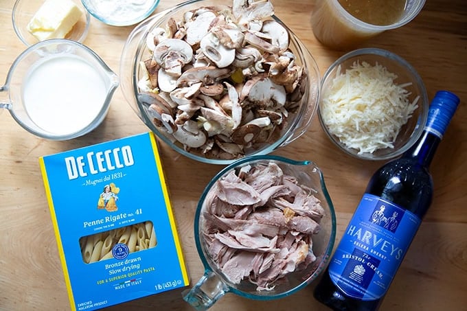 The ingredients to make turkey tetrazzini on a countertop.