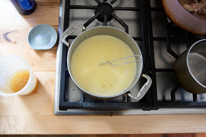 The gravy/bechamel sauce for Turkey Tetrazzini simmering on the stovetop.